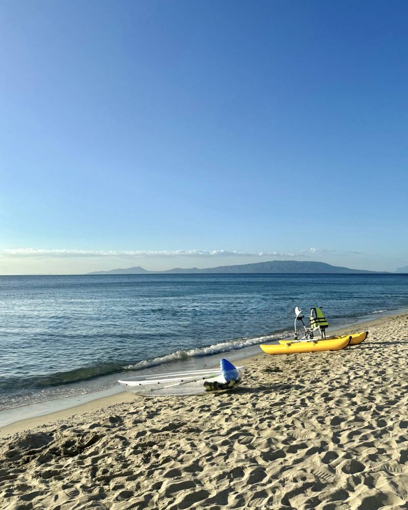 Kayaks line the shore of White Beach