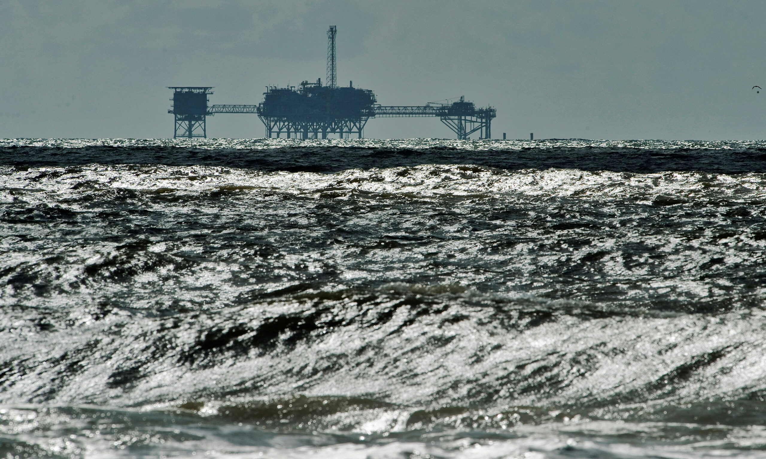 FILE PHOTO An oil and gas drilling platform stands offshore near
